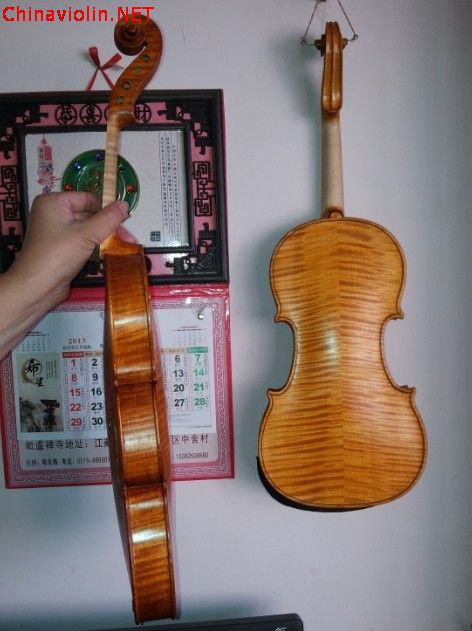 三把油漆过程中的新琴4.jpg