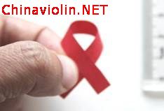 小提琴演奏技法上的一点有益的尝试——左手指肚绷带