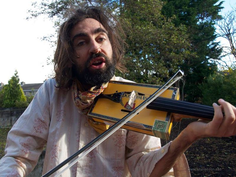 Hipi player with cigar box fiddle.jpg