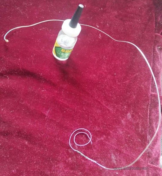 巧用502救活尼龙弦断弦