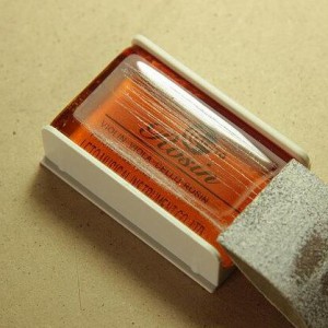 新弓上松香的快捷方法